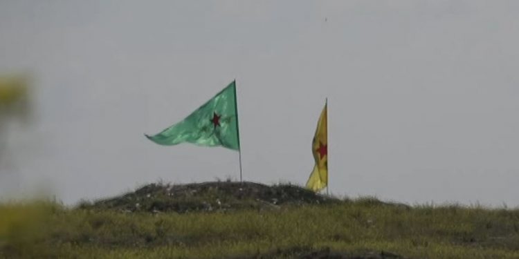 Şervanên QSD’ê ala xwe li ser girê Baxozê daçikand