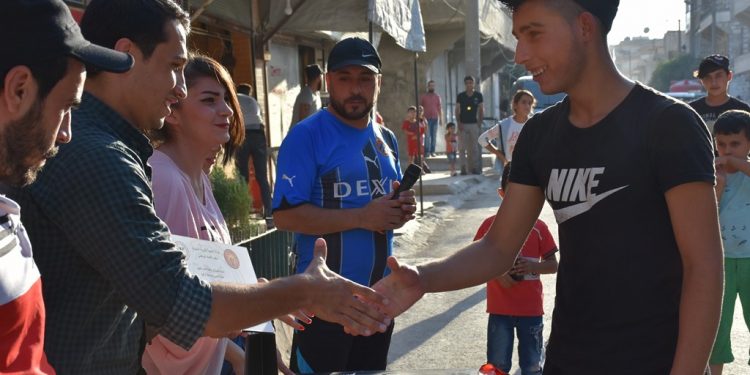 Ji bo pêşxistina werzîşê Ciwanên Şoreşger li Helebê pêşbirka bezê organîze kir