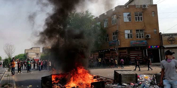 Protestoyên li Iraqê: Ji 1’ê Cotmehê û vir ve 450 kes mirin, 20 hezar jî birîndar bûn