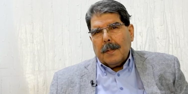 Muslim: Kobanê lîstikên dijmin hemû raxist pêş çavan