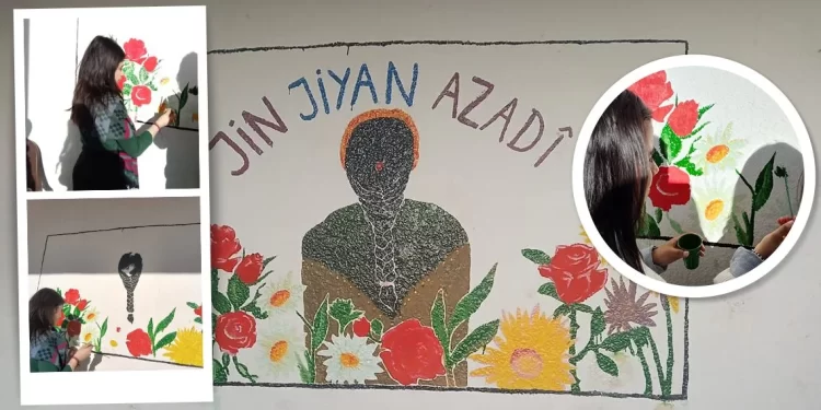 Yekîtiya Jinên Ciwan Li Dêrikê Li Ser Sûrên Kezî Ku Sembola Berxwedana Jinên Kurd e Boyax Kirin