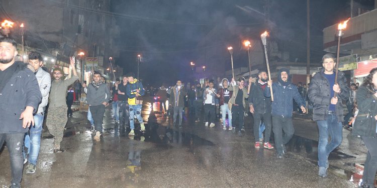 Kürt gençliğinden Efrin işgaline karşı meşaleli yürüyüş