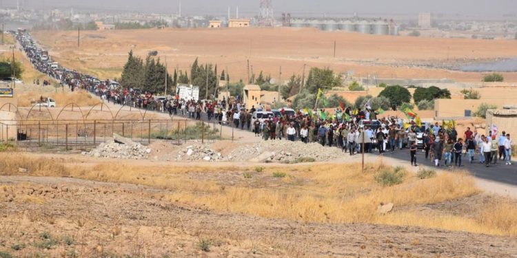 İşgal tehditlerine karşı binler yürüdü: ‘Kazanımlarımızı koruyacağız’