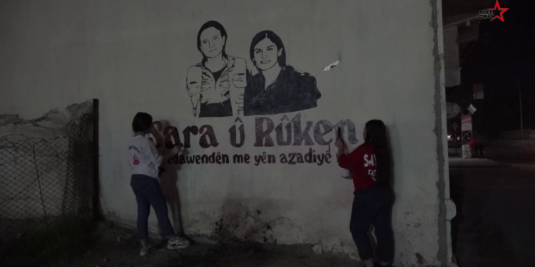 Qamışlo genç kadınları, şehit Sara ve şehit Ruken için duvara resim çizdi