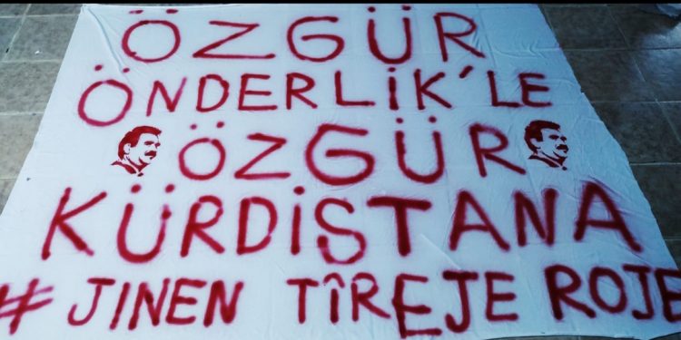 Jinên Tîrêjên Roje İnisiyatifinden pankart ve duvar yazılama çalışması